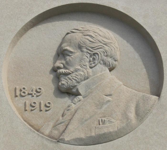 Limestone relief of Henry Clay Frick on exterior of Frick Fine Arts Building